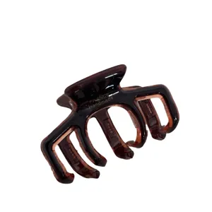 Élégante pince à cheveux en acétate marron, taille moyenne, pour coiffures quotidiennes.