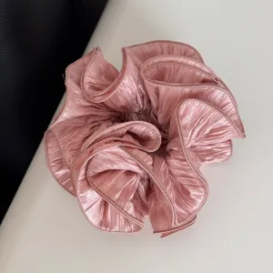 Pink bubble yarn hair scrunchie, sweet ruffled design, elegant hair accessory for women.