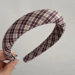 Vintage plaid fabric headband detail close-up showing soft texture and classic retro style.
