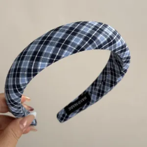 Blue plaid fabric headband detail view, stylish retro hair hoop with handmade inner label.