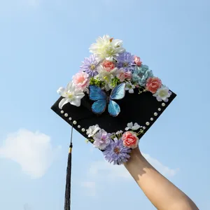 Exquisite handmade decorated graduation cap detail with colorful floral arrangements