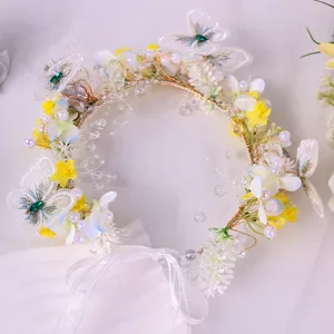 Handmade butterfly floral headband with pearls and crystals for wedding bridal hair accessories.