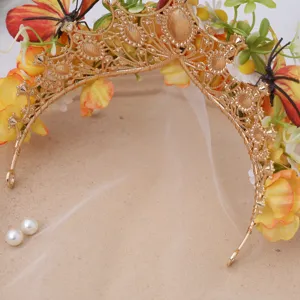 Baroque luxury gold floral tiara crown headband with butterflies and mesh veil for photography.