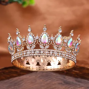 Stunning gold round crown tiara with sparkling rhinestones and iridescent crystals for bridal.