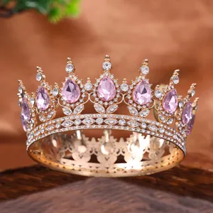 Exquisite vintage gold round crown tiara with pink teardrop rhinestones for bridal.