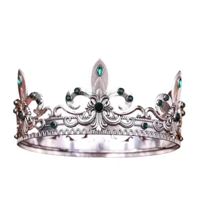 Baroque vintage silver full circle crown with green rhinestones, elegant bridal tiara.