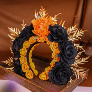 Gothic Halloween floral headband detail, featuring black and orange roses with golden leaves.