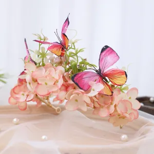 Exquisite pink butterfly floral crown headband, elegant wedding party hair accessory for women.