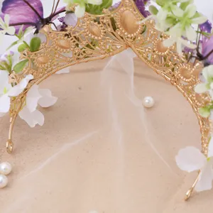 Baroque gold floral crown tiara with butterfly silk flowers and veil for photoshoot.