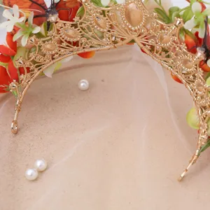 Baroque gold floral crown tiara close up detail shot, elegant bridal hair accessory for events.