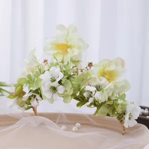 Exquisite baroque floral crown hair accessory detail, ideal for wedding party photography.