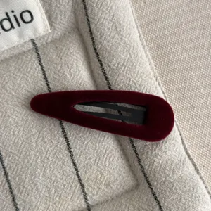 Wine red velvet BB hair clip detail, elegant side hairpin and bangs clip for women.