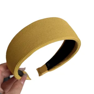 Large bandeau de cheveux tricoté côtelé pour femmes, accessoire rétro jaune confortable.