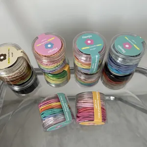 Kleurrijke haarelastiekjes set in doorzichtige plastic potjes, elastisch voor meisjes en kinderen.