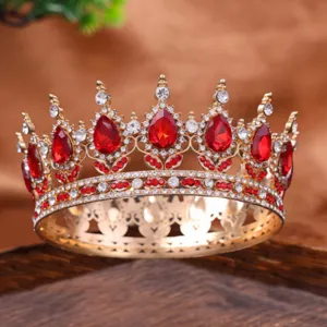 Gold alloy full circle crown tiara with red and white rhinestones for bridal wedding.