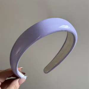Glossy patent leather headband detail, wide high-crown lilac purple hair hoop for women.