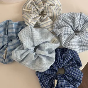 Blue plaid stripe hair scrunchie set detail, aesthetic cloth fabric hair tie for women daily style.