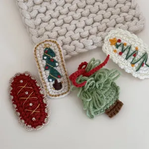 Handmade crochet Christmas hair clips cute knitted hair barrettes for sweet girls and kids.