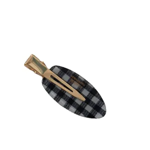 Korean style oval black and white plaid hair clip with gold metal alligator clip for women.
