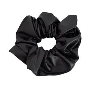 Black PU leather hair scrunchie for women, soft elastic hair tie and ponytail holder accessory.