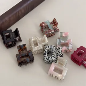 Mini acetate hair claw clips set, cute small geometric square hair catch for women and girls styling.