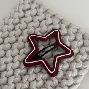 ster leren haarspeld detailopname close up van schattig haaraccessoire ontwerp
