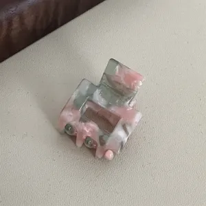 Mini acetate hair claw clip, small square hair catch for bangs, pink marble design.