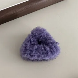 Cute fluffy purple plush triangle hair claw clip for women, daily fashion accessory.