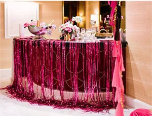 Fuchsia metallic foil fringe curtain for party decoration, wedding and stage background.
