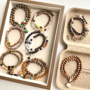 Collection de bracelets en perles de bois avec styles double cercle santal et cristal agate.