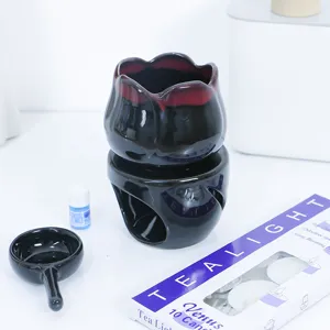 Black ceramic essential oil burner and candle diffuser set for home fragrance and relaxation.