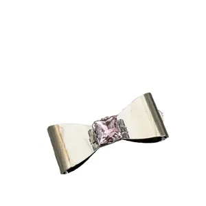 Y2K silver metal bow hair clip with pink rhinestone cute duckbill hair accessory main view