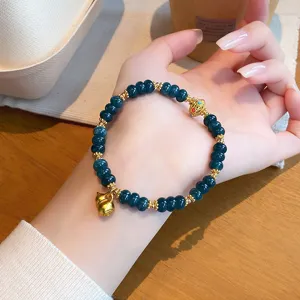 Elegant Chinese style blue jadeite gemstone bead bracelet with gold gourd pendant for women