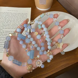 Exquisite blue chalcedony beaded bracelet featuring sparkling diamond butterfly and cute charms.