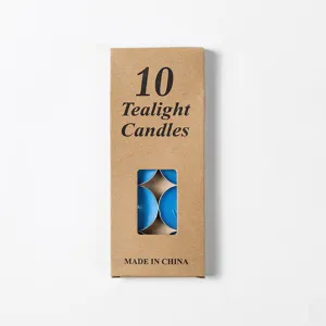 Set de 10 velas de té azules en caja de papel kraft, ideales para decoración y fiestas.