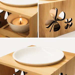 Bamboo essential oil burner with ceramic dish and clover cutout design for aromatherapy.
