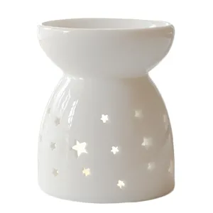 Quemador de aceite de cerámica blanca con estrellas, elegante lámpara aromática para decoración hogar.