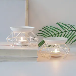 Geometric ceramic candle oil burner and essential oil lamp for home fragrance decor relaxation.