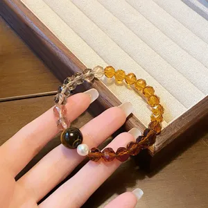 Exquisite gradient crystal wheel bead bracelet detail view, vintage design delicate wrist chain.