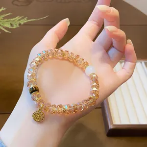 Detailed view of the new Chinese style gradient crystal faceted bead bracelet with chic charms.