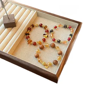 Chinese style lucky crystal beaded bracelet set with wooden and glazed charms for festive wear