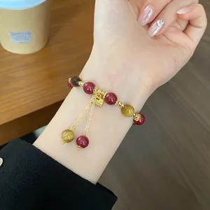 Nuovo bracciale retrò cinese in cinabro e occhio di tigre con lucchetto nappina dettaglio.