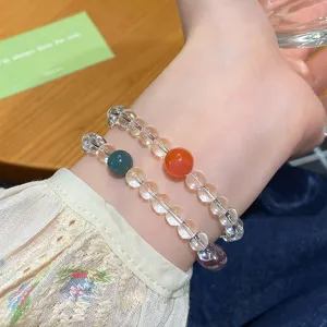 Closeup detail of the double layer crystal beaded bracelet with colorful candy accent stones.