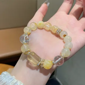 Natural yellow quartz crystal bracelet gold beads elegant Chinese style luxury jewelry detail view