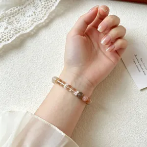 Elegant multi-color crystal gemstone bracelet with sterling silver spacers for daily wear.