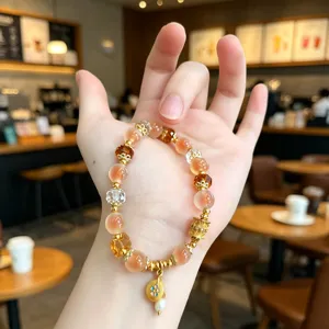 Chinese stijl oranje agaat kristal kralen armband met gouden hanger voor de vrouwen.