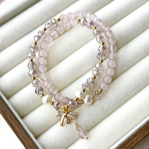 Bracelet de perles en œil de chat violet double couche doux avec pendentif nœud mignon.