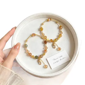 Retro Chinese style crystal beaded bracelet with lucky Pi Xiu charm and colorful quartz stones.