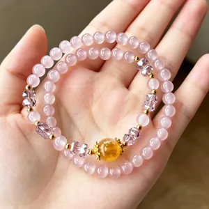 Bracelet double en perles d'œil de chat violet avec perles de cristal et détails métalliques