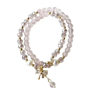 Bracelet double couche en pierre d'œil de chat violet avec perle de cristal et nœud papillon
